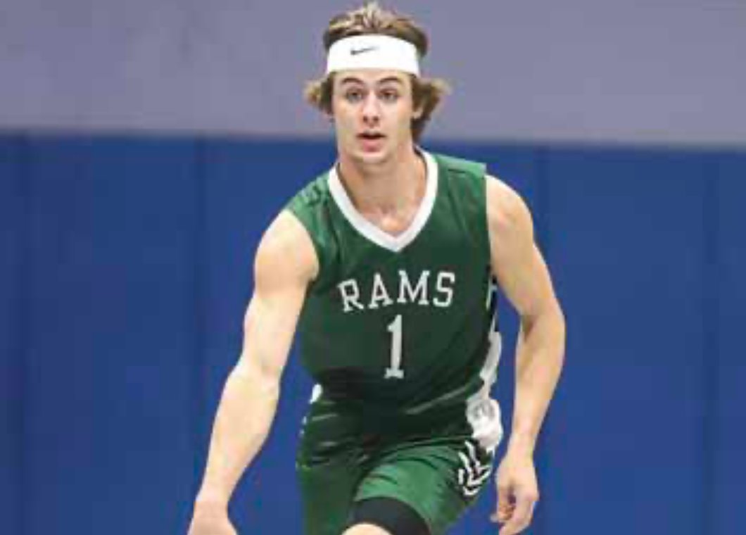 Kix Wilson (1) brings the ball up the floor for the Kemper Academy Rams.